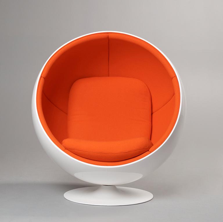 An Eero Aarnio white fiberglass and orange fabric 'Ball chair', by Adelta, Finland, post 1991.