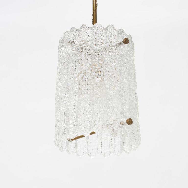 Carl Fagerlund, a pair of brass and glass wall lights and a ceiling light, Orrefors.