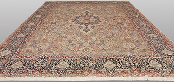 A 'Millefleur' Kerman Laver carpet, c. 398 x 300 cm.