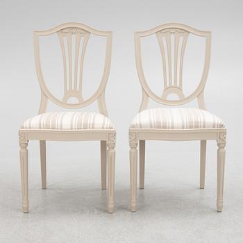 A Gustavian Style Dining Table and 10 Chairs, second half of the 20th Century.