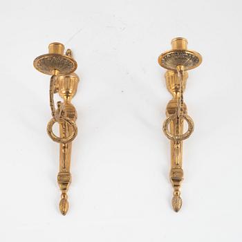 A pair of 'Törne' brass one-light wall ligths from IKEA's 18th Century collection.