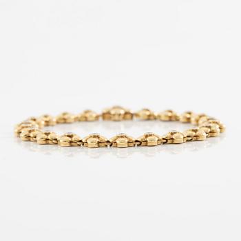 Armband, 18K guld med briljantslipade diamanter.