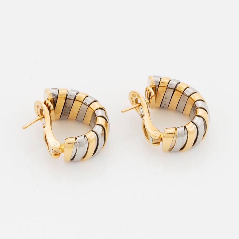 A pair of Bulgari "Tubogas" earrings in 18K gold and steel.