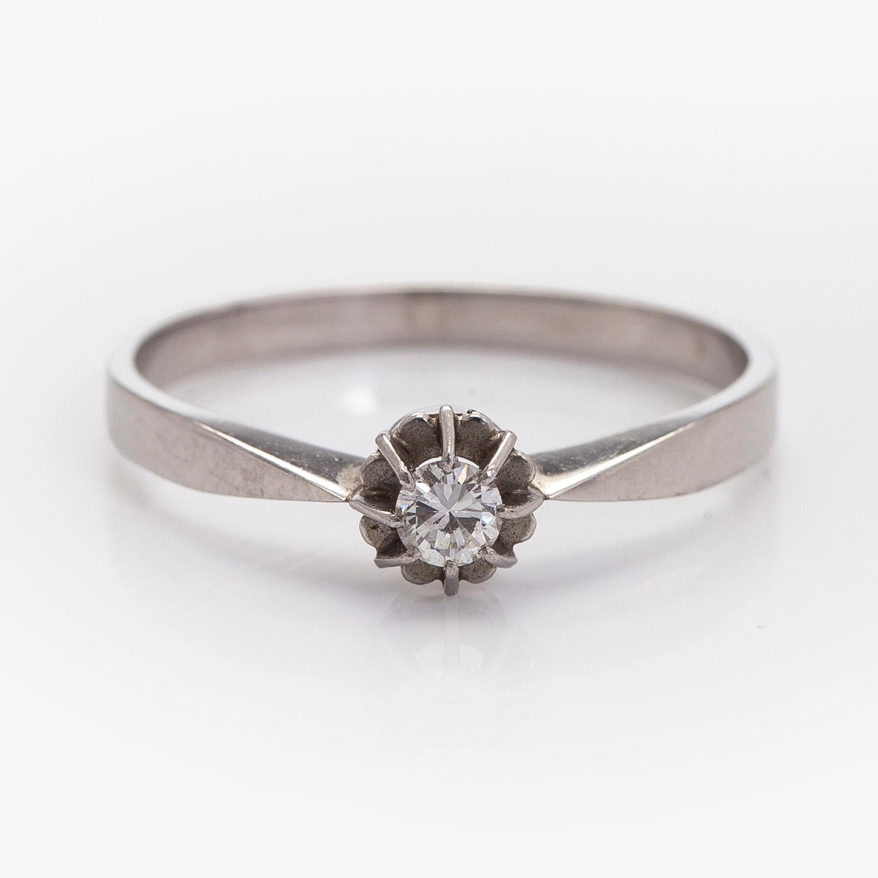 Ring, brilliant cut diamond, platinum, Peltonen & Kni, Helsinki.