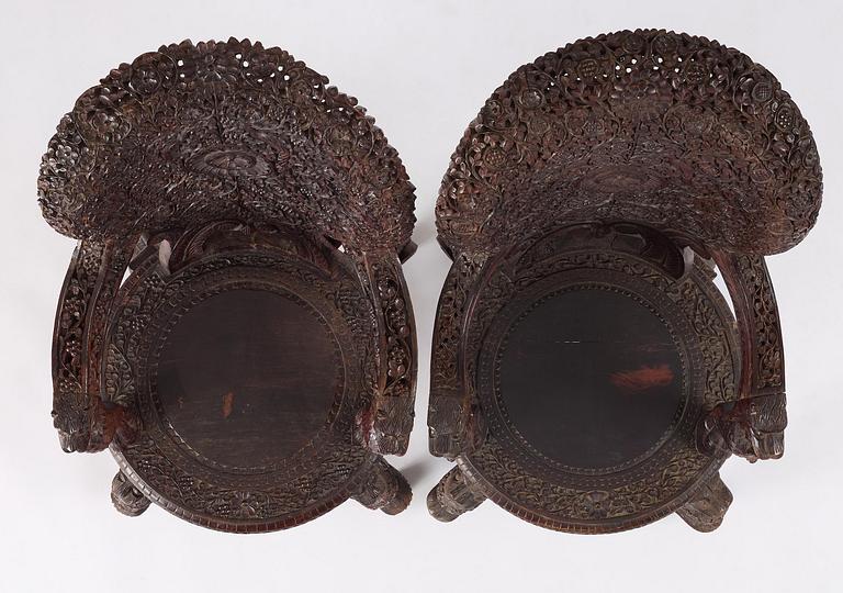 A pair of carved 'blackwood' armchairs, Bombay presidency, British Raj, circa 1880.