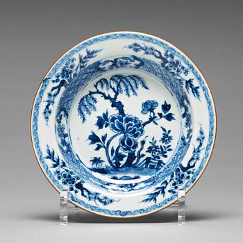 A matched set of 12 blue and white dessert dishes, Qing dynasty, 18th Century.