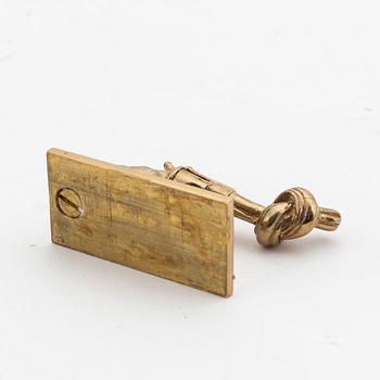 Carl Fredrik Reuterswärd, a brass 'Non violence' sculpture from Skultuna, signed.