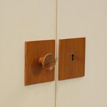 Josef Frank, a set of three bookcases model "B 2255", Firma Svenskt Tenn, mid-20th century, provenance Estrid Ericson.