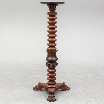 A mahogany pedestal, probably England, first half of the 20th century.