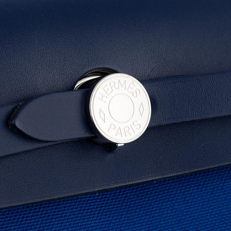 Hermès, a 'Herbag Zip 31' handbag in Bleu Saphir Hunter leather and Bleu Billard military canvas, 2021.