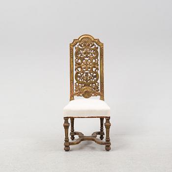 A carved Baroque style chair, second half of the 19th Century.