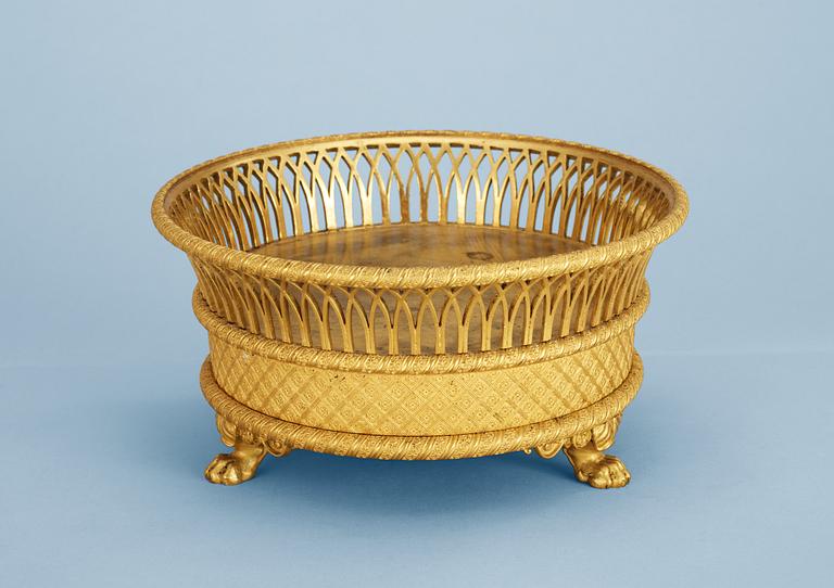 An Empire early 19th century gilt bronze coaster.