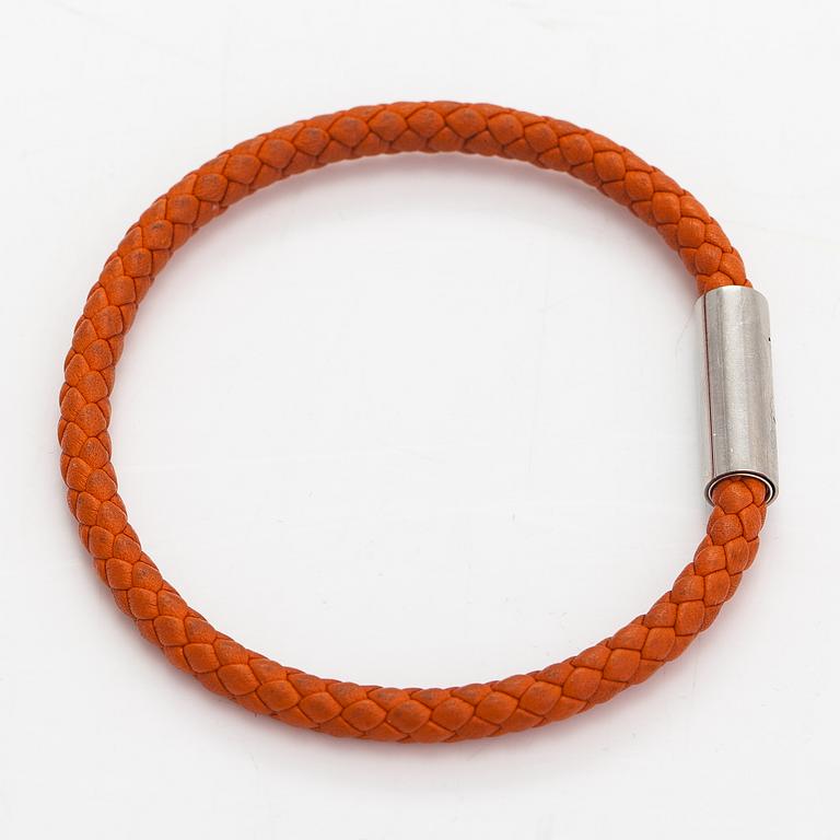 Hermès, A leather and metal bracelet. Marked Hermès Made in Italy.
