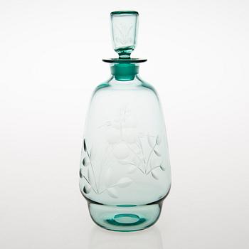 A set of five drinking glasses and a carafe from 1930s.