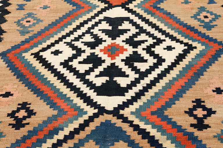 A kelim rug, Veramin, 316 x 145 cm.