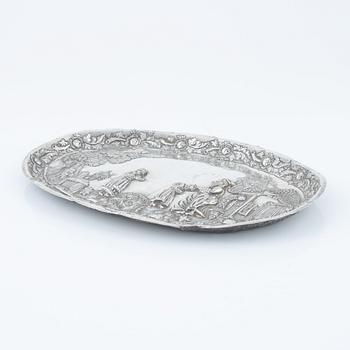 A baroque-style silver dish, 19th century.