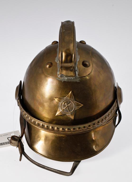 BRANDHJÄLM, mässing, 1900-talets början.