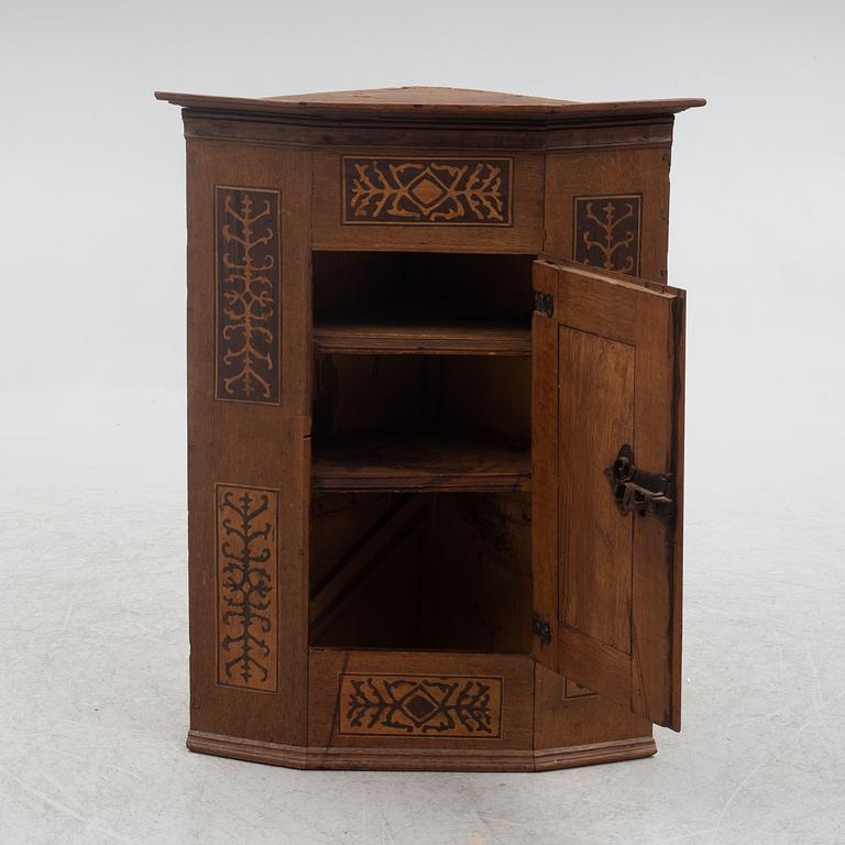 Corner cabinet, dated 1769.
