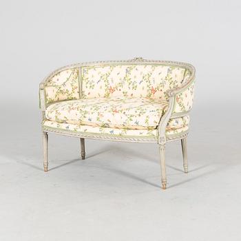 A Louis XVI early 1800s sofa.