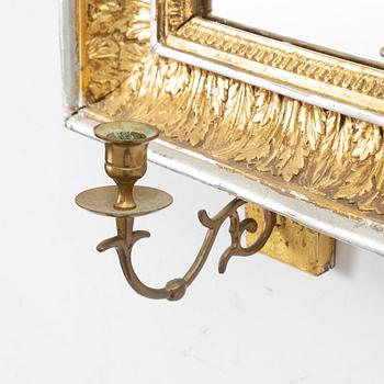 A gilt-gesso two-branch Empire girandole mirror, first part 19th century.