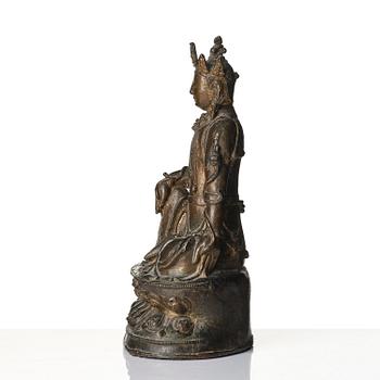 A bronze sculpture of Guanyin, Ming dynasty (1368-1644).