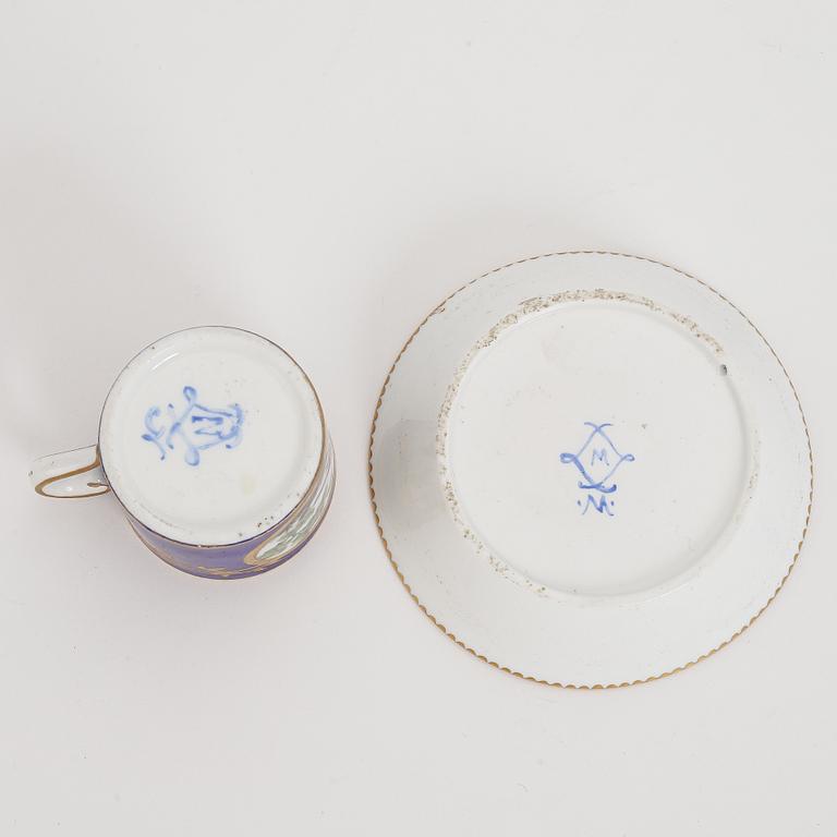 A Sèvres porcelain cup and sacuer, probably 1770's.