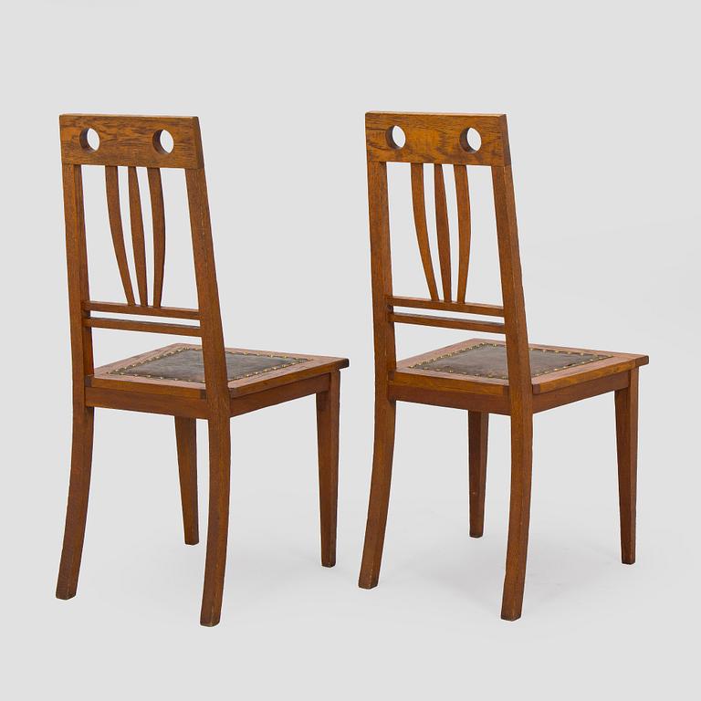 Dining table and six chairs, early 1900.