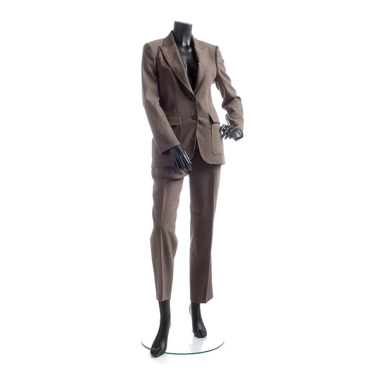 GUCCI, a two-piece suit consisting of jacket and pants.