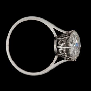 A 2.65 cts old-cut diamond ring. Quality circa I/VS.