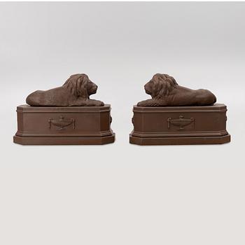 A pair of garden sculptures.