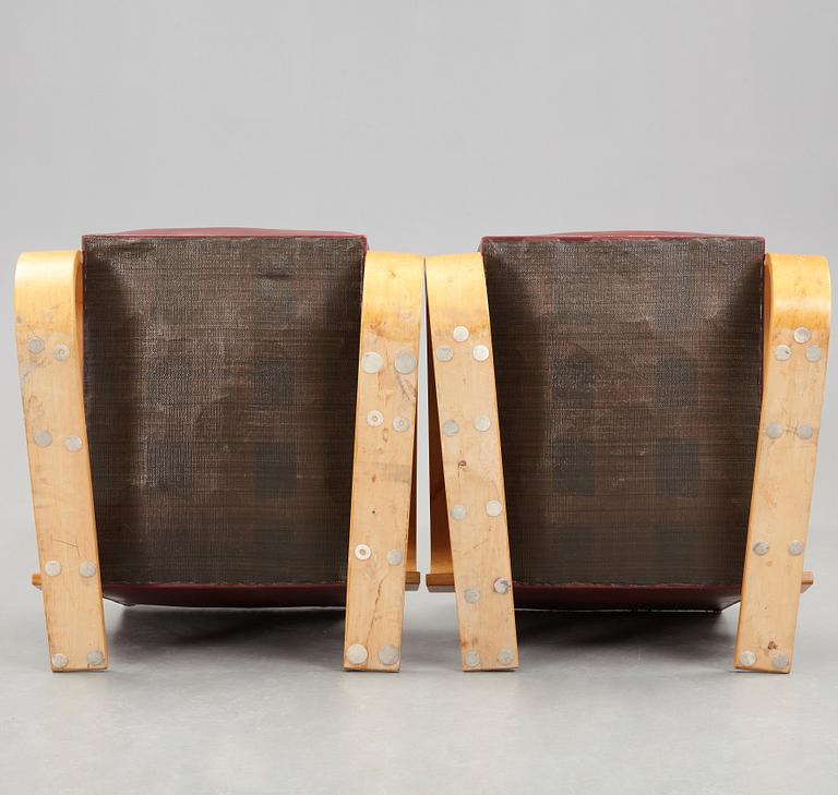 Alvar Aalto, A pair of Alvar Aalto tank easy chairs, model 400 probably by Huoneakalu-ja Rakennustyötehdas Oy, Finland, for Artek,