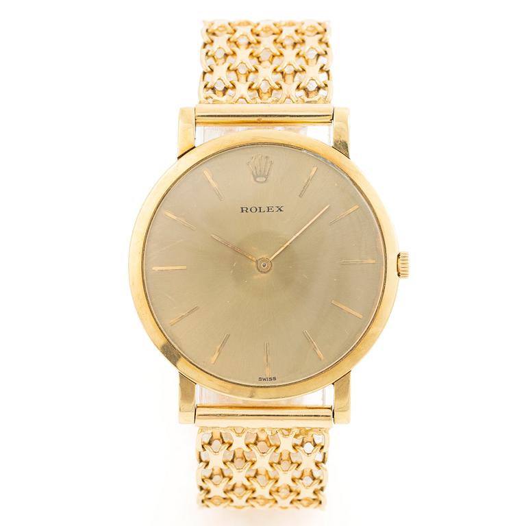 Rolex, 18K gold, with an 18K gold bracelet, wristwatch, 31.5 mm.