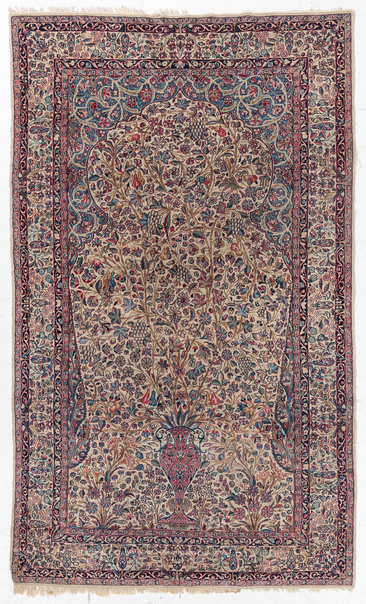 A semi antique Kirman rug, South Persia, c. 228 x 136 cm.