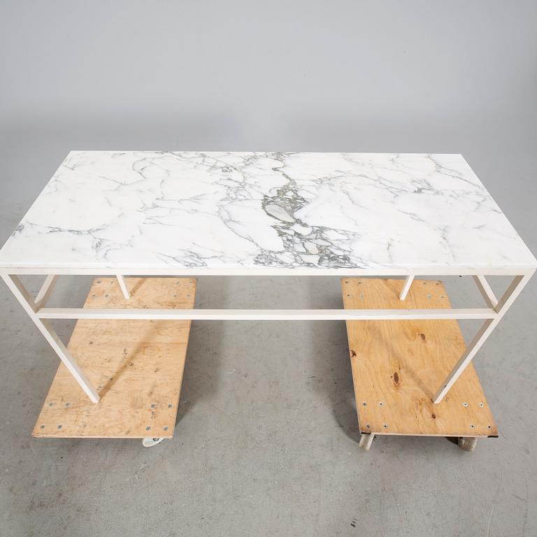 A marble table, contemporary.