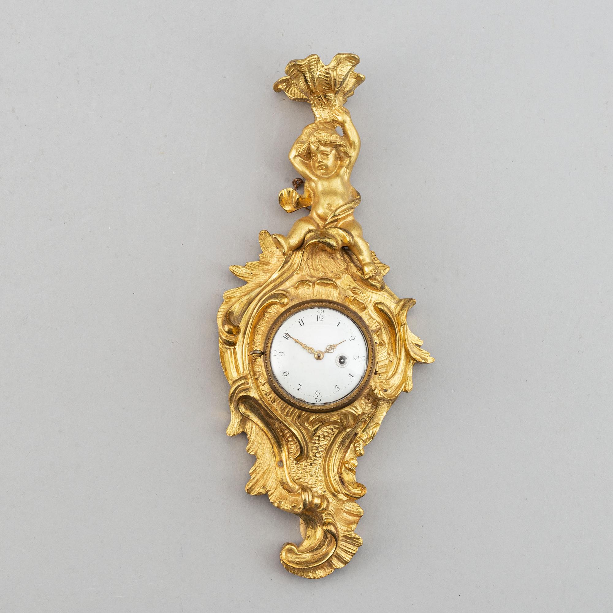 Väggur, rokokostil, late 19th or early 20th century.