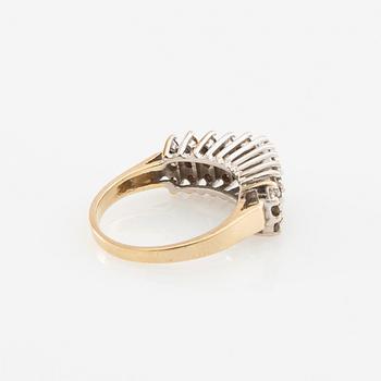 Ring in 14K rose and white gold set with round brilliant-cut diamonds.