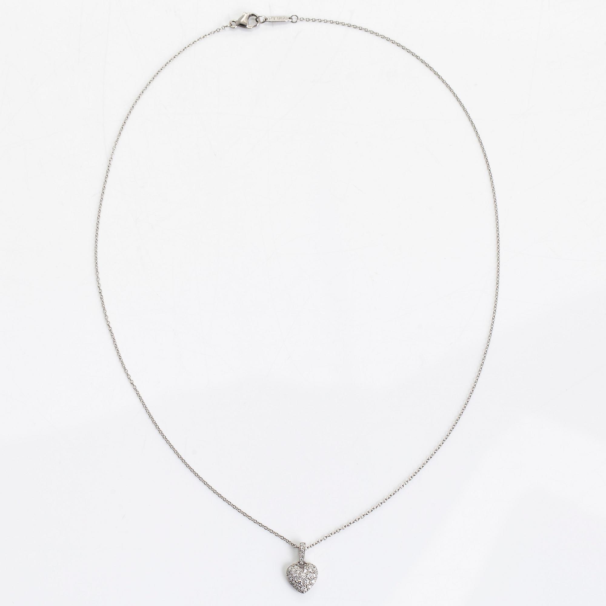 Tiffany & Co, a platinum necklace with a pendant in the shape of a heart, with diamonds totalling approximately 0.27 ct.