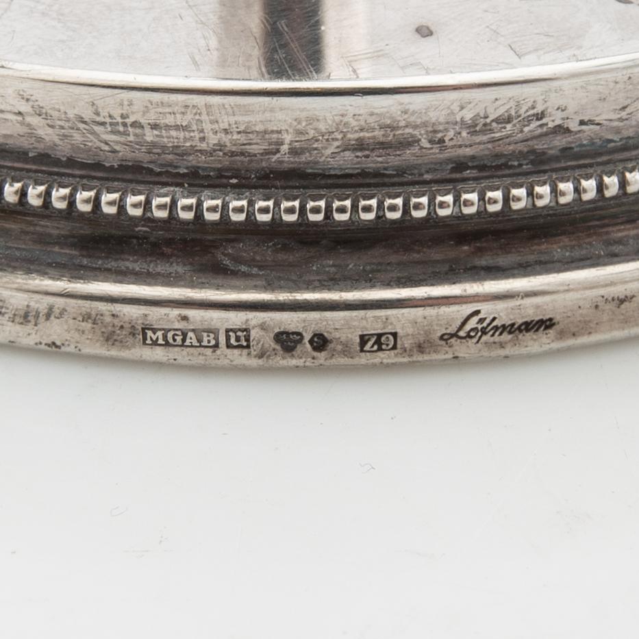 Eric Löfman, candlesticks, a pair, silver, MGAB, Uppsala, 1974.