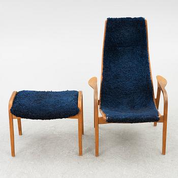 Yngve Ekström, a Swedese 'Lamino' armchair and foot-rest, Sweden, 2004.