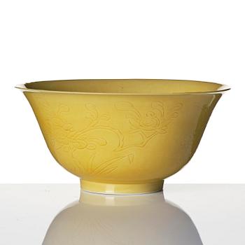 A yellow glazed 'prunus' bowl, Qing dynasty, 18th century.