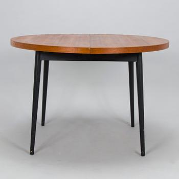 A mid-20th century dining table.