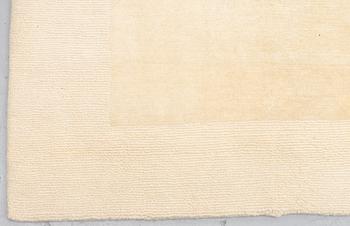 A carpet, knotted and loomed, ca 328 x 347 cm.