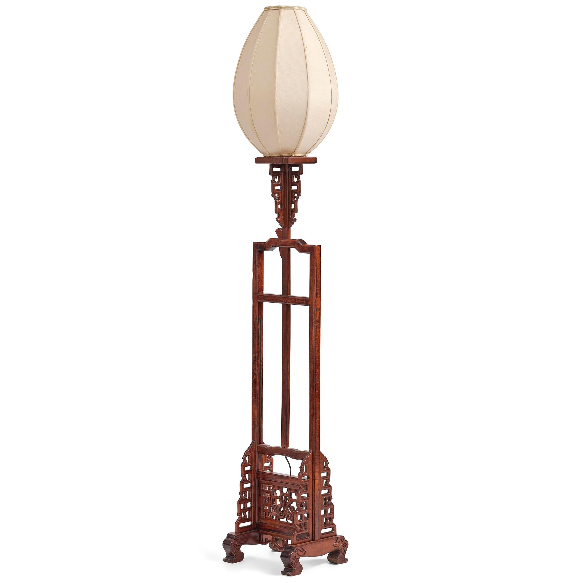 A Chinese wooden floor lamp, later part of the 20th century.