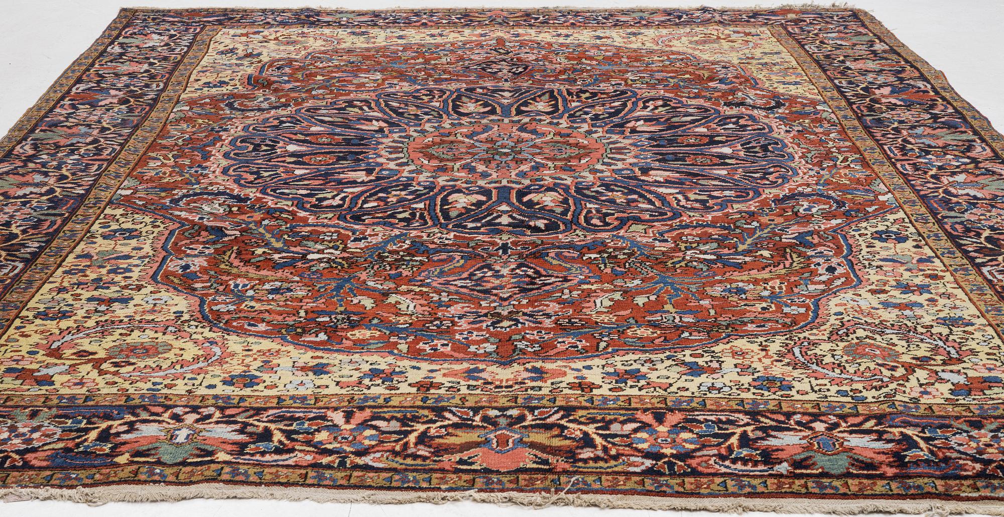 A semi-antique Ahar carpet, c 335 x 275 cm.