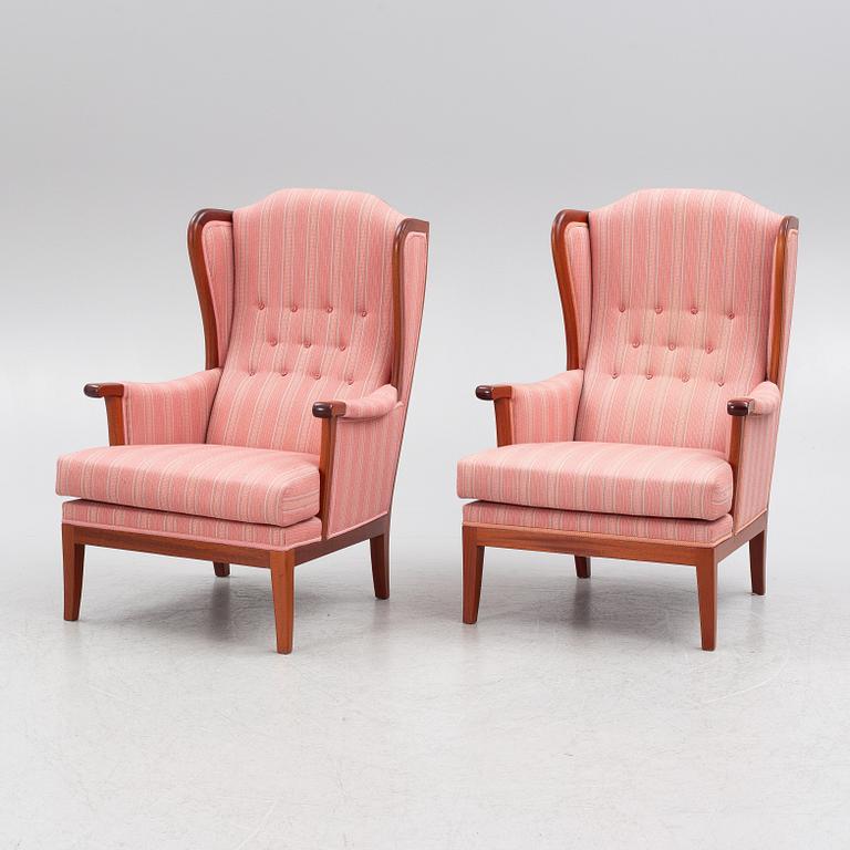 Carl Malmsten, a pair of 'Husfadern' armchairs, OH Sjögren 1988.