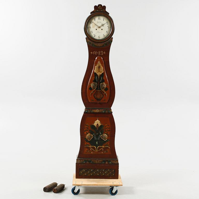 A grandfather clock dated 1823.