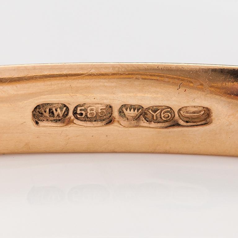 A 14K gold and synthetic sapphire bracelet. Westerback, Helsinki 1952.