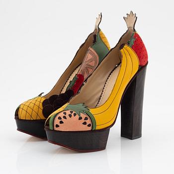 Charlotte Olympia, a pair of leather, suede and wood pumps, size 36.