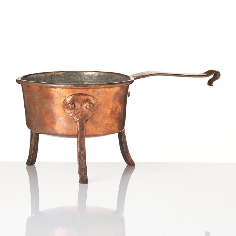A copper saucepan, 18th century.