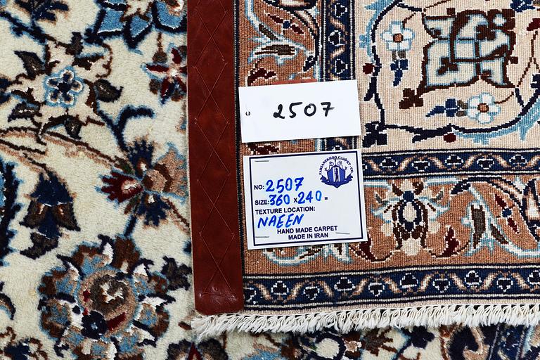 A carpet, Nain, so called 9 laa, part silk, ca 360 x 240 cm.
